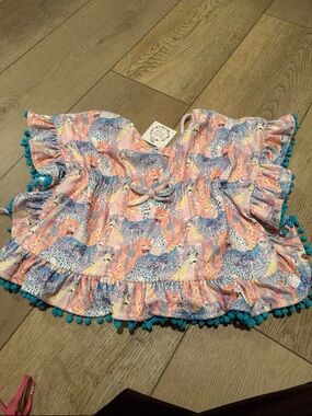 Cheeky Plum coverup. NWT.